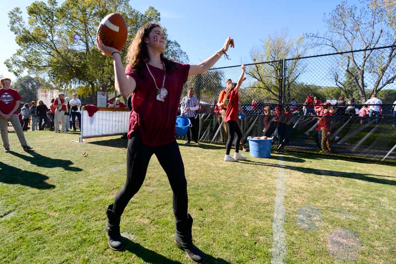 Woman throwing a football