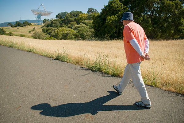 man walking on path