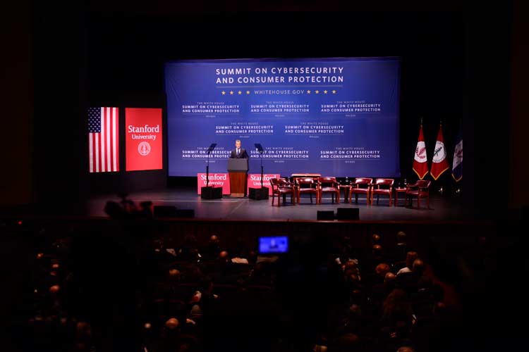 Jeff Zients speaking on stage at Memorial Auditorium