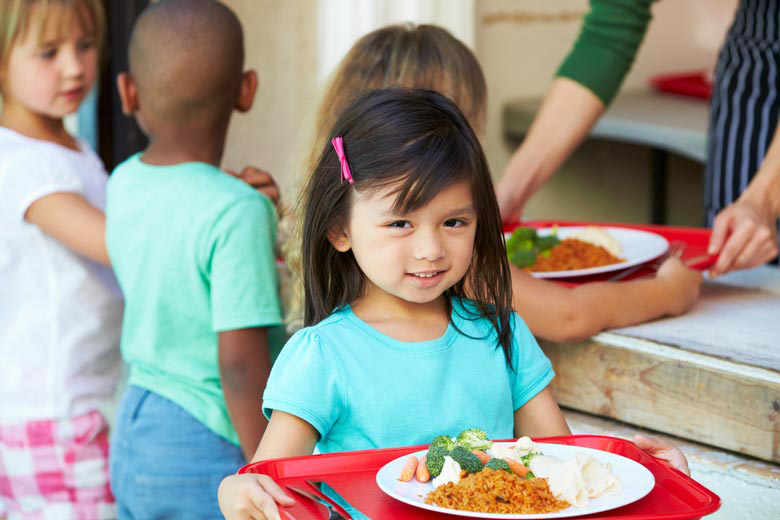 Child with school lunch