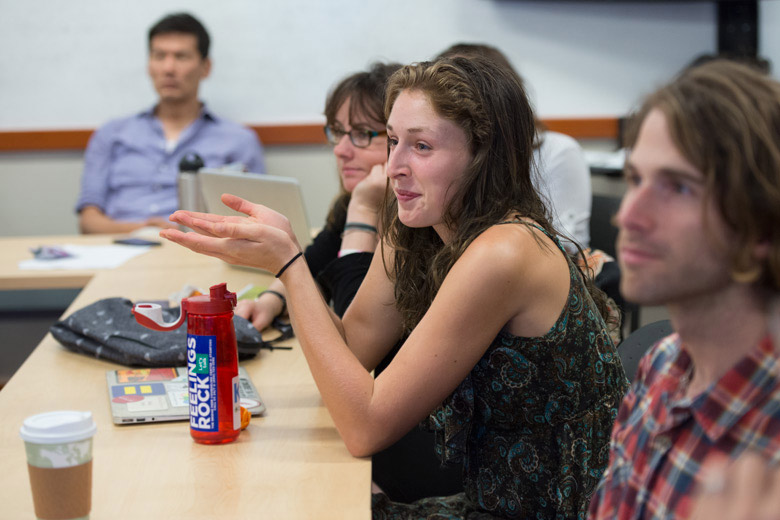 Stanford undergraduate Maria Doerr joins in a discussion about audio production in Jake Warga's audio documentary workshop.