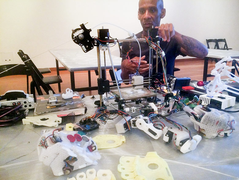 Musician Onyx Ashanti in his workshop creating wearable appendages with which he makes music