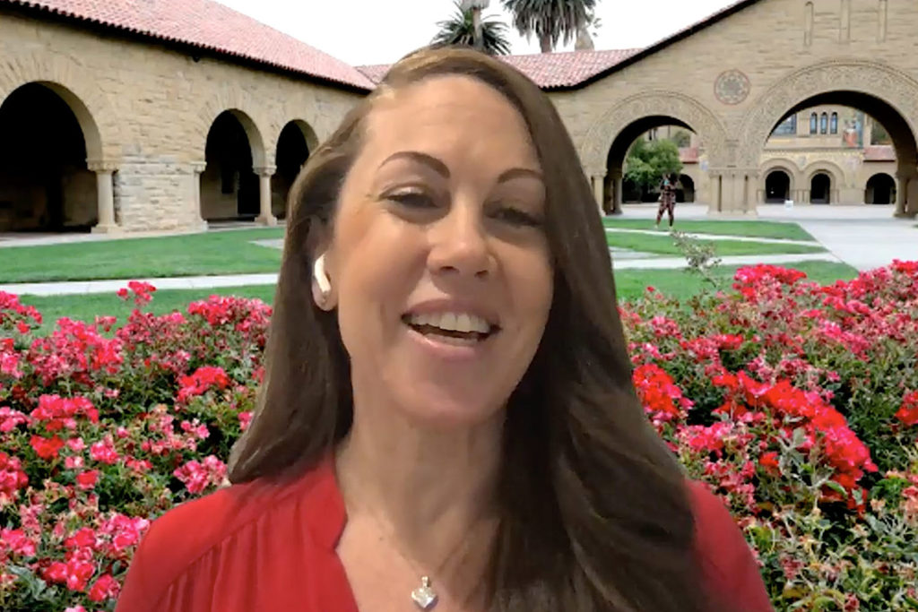 Cheryl Brown in front of a virtual background of Memorial Court