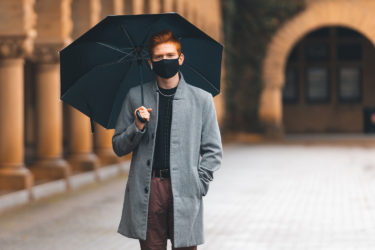 undergraduate with umbrella