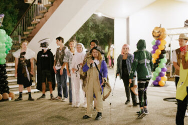 Students lined up for the costume contest at Tresidder