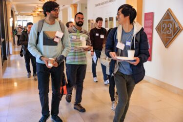 Attendees entering the event.