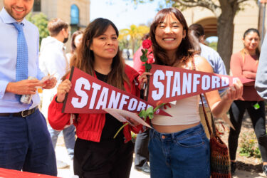 Two students in a group shot.