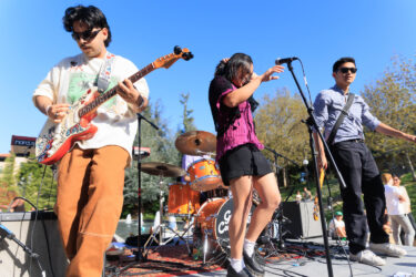 Lead singer and guitar player on stage