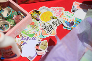 Stickers spread out on a table.