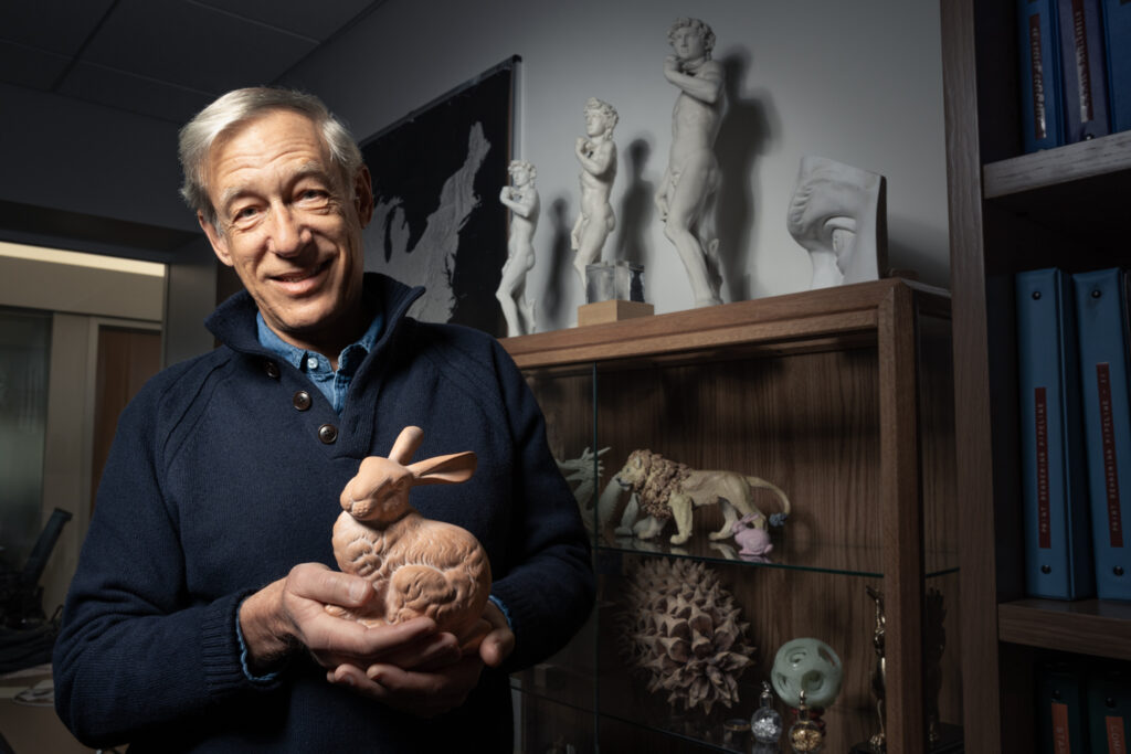 Marc Levoy holding the terra cotta Stanford Bunny