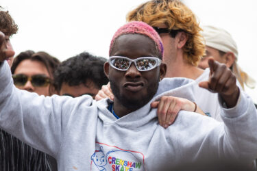 Student wearing reflective sunglasses.