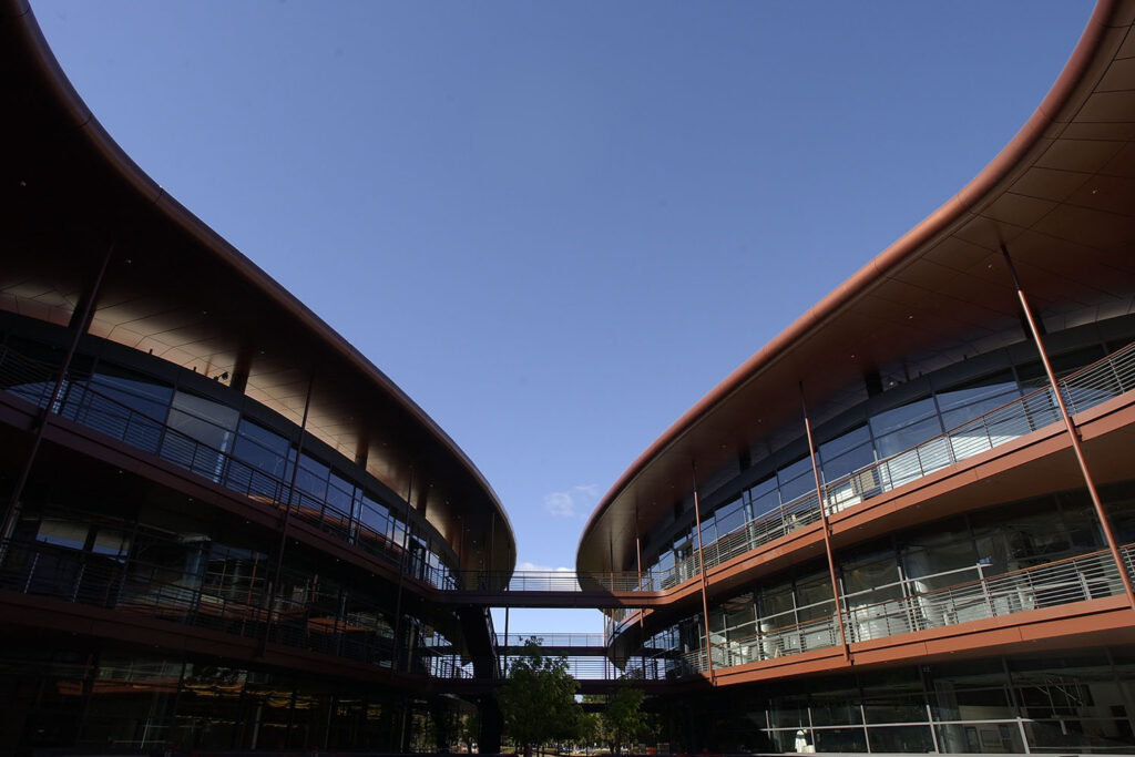 The multi-tiered walkways that surround the courtyard of the Clark Center allow the viewer many different vantage points of the building's design and the cutting-edge research occurring just behind the glass.