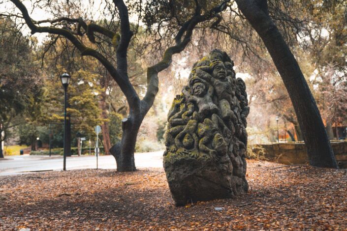 Opawe and Namawe, carved in pumice stone, references the story of a flood that destroyed the ancestral world after a man tricks his older brother into killing his wife. The younger brother’s family is depicted on one side of the stone sculpture, and the twisted bodies of the village people drowning in the flood are on the other. (Image Credit: L.A. Cicero)