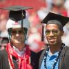 Former football teammates Josh Nunes and Jemari Roberts at Commencement's Wacky Walk / Linda A. Cicero