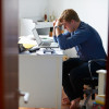 boy overwhelmed with homework / Monkey Business Images/Shutterstock