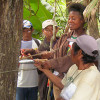 Wapichana field researchers measure trees