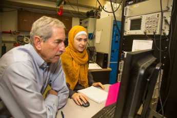 Mark Zobeck and Fatemeh Rassoulil at computers. /Photo: Stacy H.Geiken