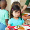 Child with school lunch