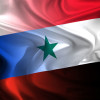 flags of Russia and Syria waving together / eXpose/Shutterstock