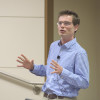 Nicholas Bloom speaking to the Faculty Senate on April 14, 2016