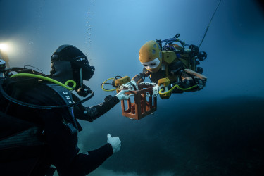 Robot and human underwater