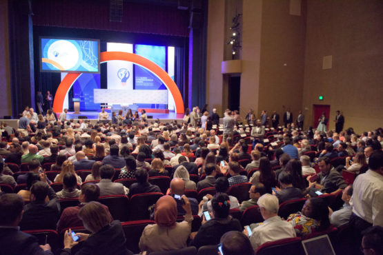 seats in Memorial Auditorium full of people waiting for the plenary session of GES 2016 to begin