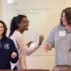 Stanford Anti-Violence Educators Jazzmin Williams, Lola Tijani and Erika Lynn Kneeger lead a practice training session