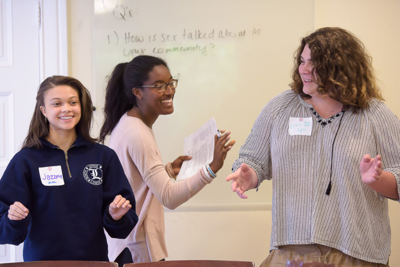 Stanford Anti-Violence Educators Jazzmin Williams, Lola Tijani and Erika Lynn Kneeger lead a practice training session