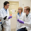 Professor Bertozzi with grad students Han Xiao and Elliot Woods