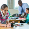 Girl in robotics class