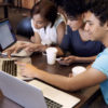 Students studying with laptops