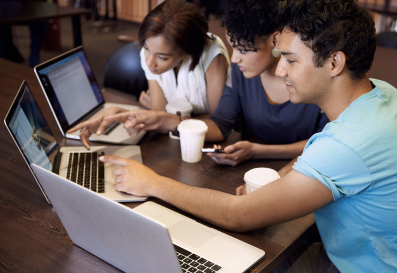 Students studying with laptops