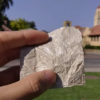 swatch of new plastic textile that dissipates body heat efficiently