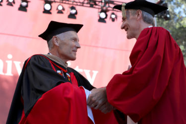 Steve Denning and Marc Tessier-Lavigne smiling