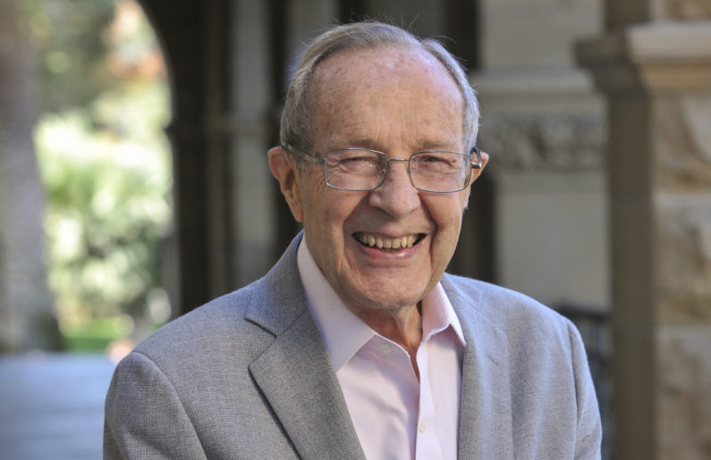 portrait of William Perry in Stanford arcade