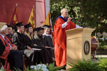 John Hennessy speaking at podium