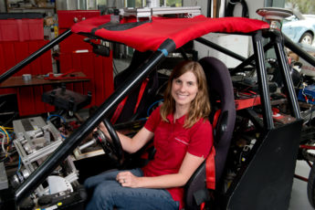 researcher Holly Russell sitting in research vehicle