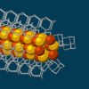 Illustration showing molecular building blocks joining the tip of a growing nanowire.