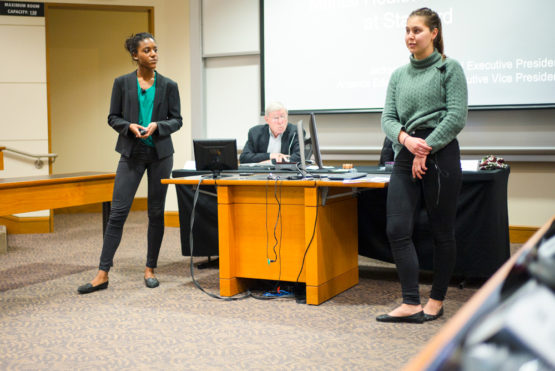 Jackson Beard and Amanda Edelman standing before the senate.