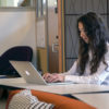 Young woman at computer.