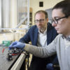 Prof. Alberto Salleo and graduate student Scott Keene in the lab