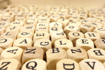 dice marked with letters of the alphabet