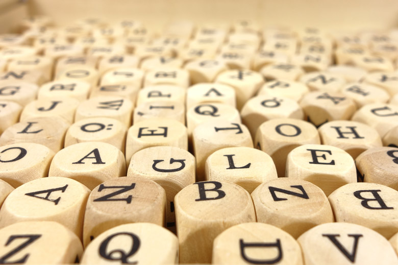 dice marked with letters of the alphabet