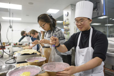 students mixing a pie filling