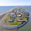 Kivalina, Alaska, is an example of a village threatened by sea level rise and extreme weather.