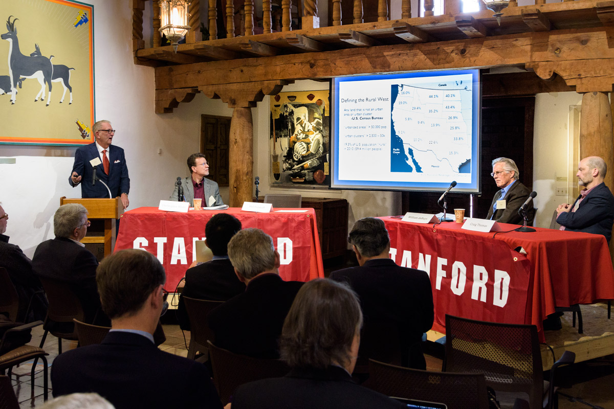 Phil Polakoff (left), consulting professor of medicine at Stanford, leads a discussion on the health challenges facing the rural west.