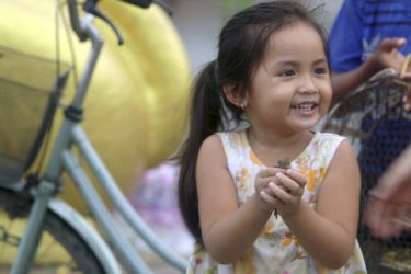 an adorable smiling young girl