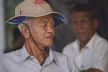 headshot of an elderly Cambodian man