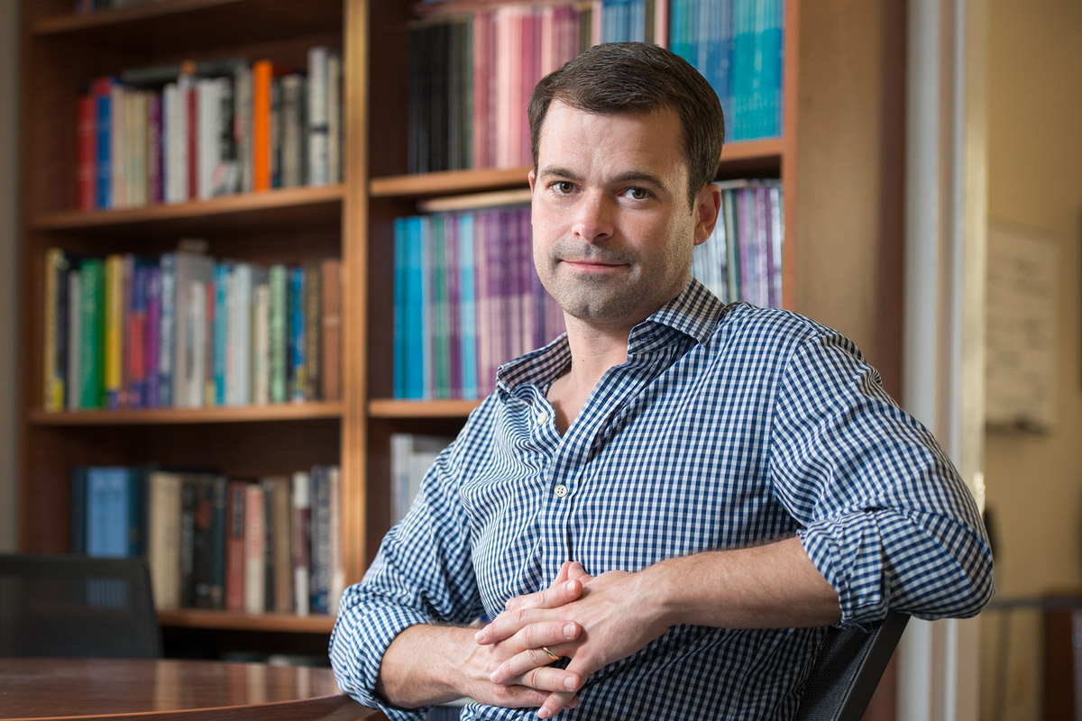 portrait of Robb Willer, professor of sociology, in his office