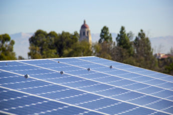 Solar panels on the Central Energy Facility looking toward Hoover Tower